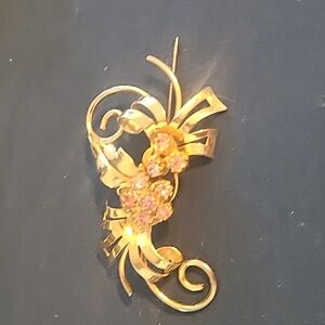 Vintage pink rhinestone gold tone flower leaf brooch